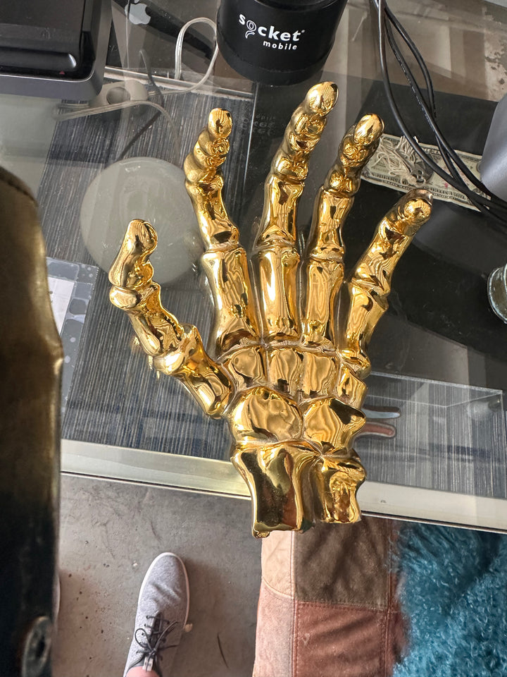 Gold bone hand