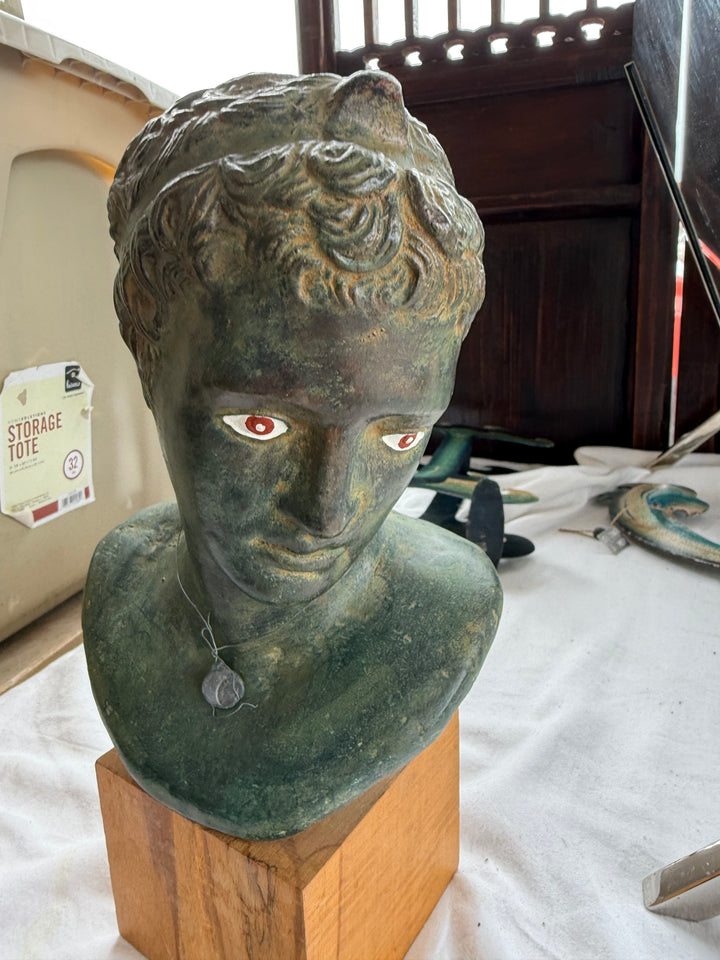 Ephebe face bust signed