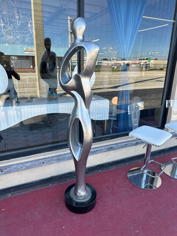 Silver tall figure