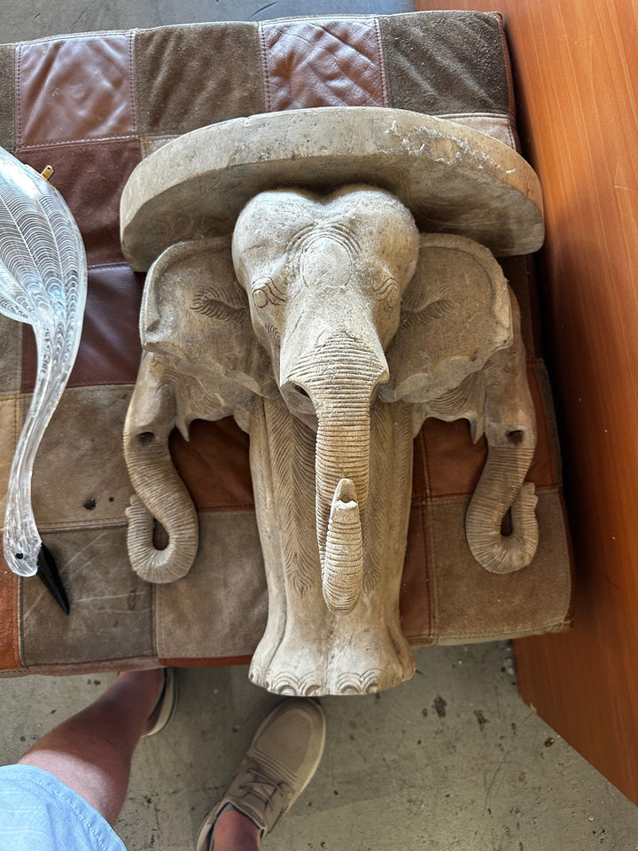 Carved elephant sconce