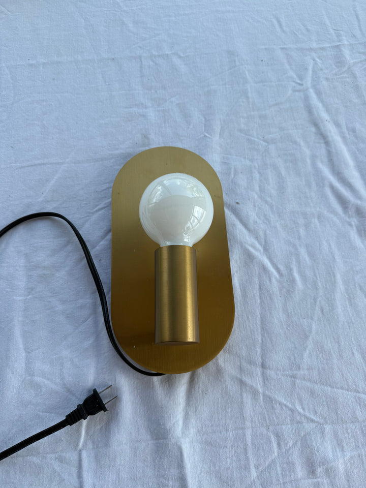 Modern brass sconce light