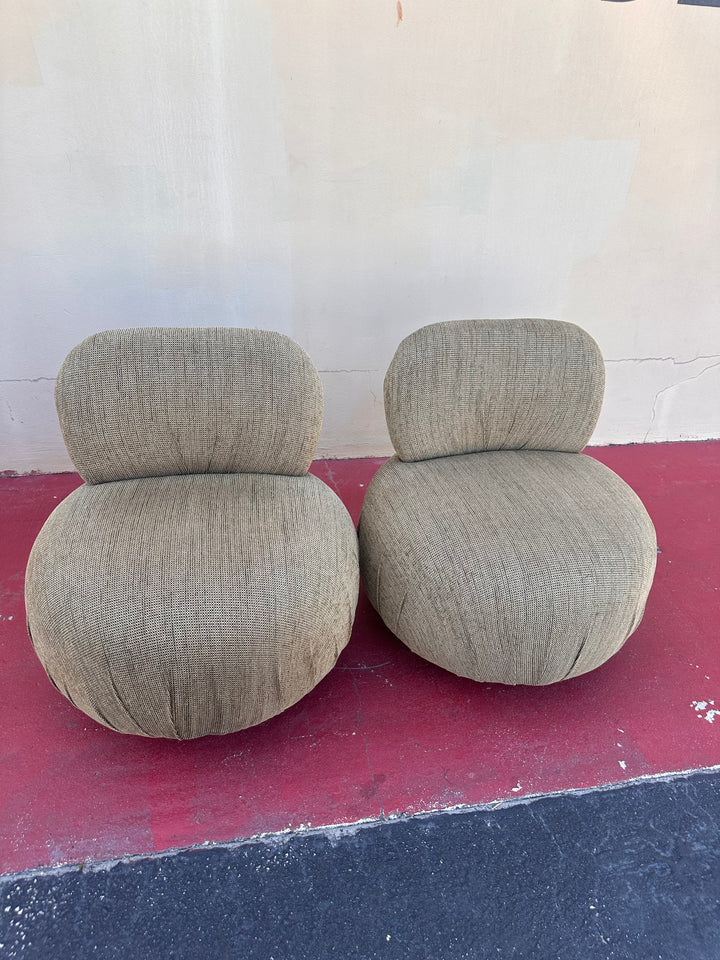 Pr swivel pouf chairs in the style of Steve Chase