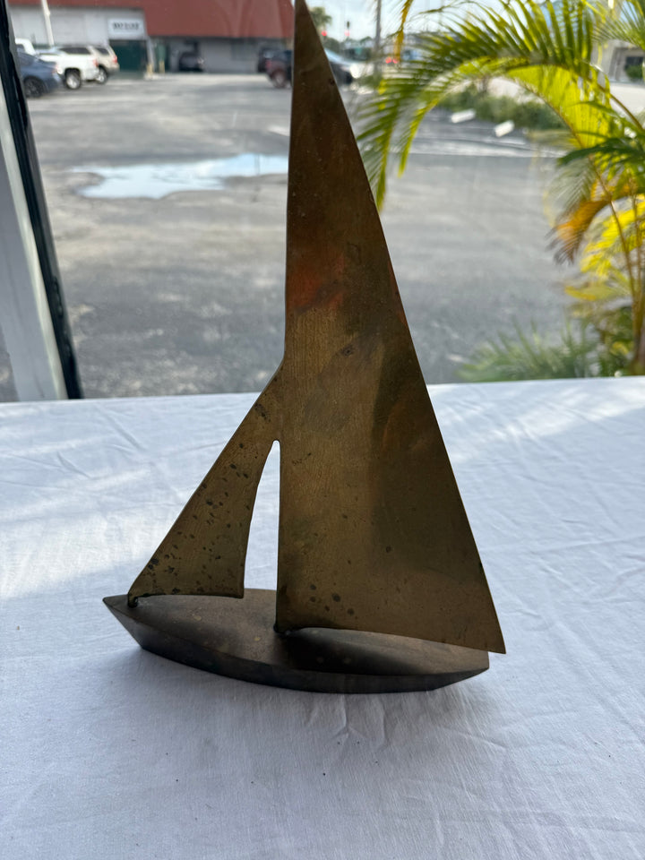 Solid brass sailboat sculpture