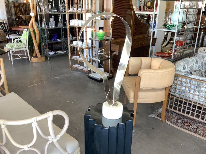 Chrome sculpture/ marble base