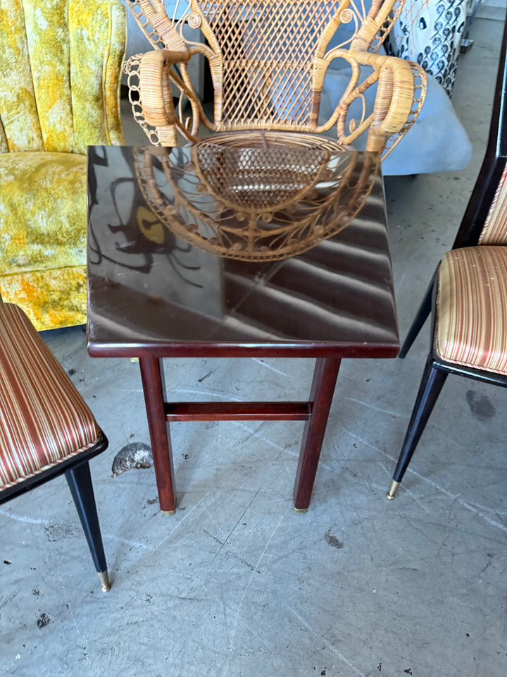 Angled lacquered side table