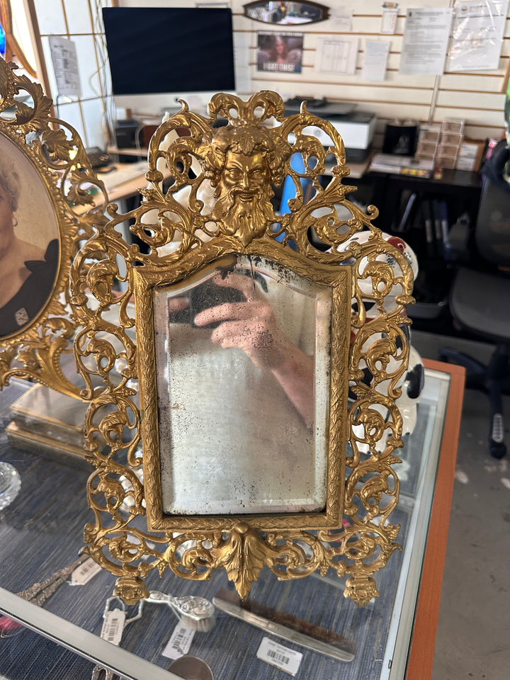 Antique brass mirror