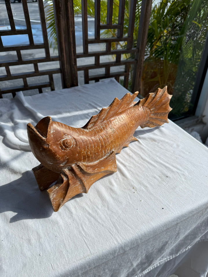 Carved wood fish sculpture