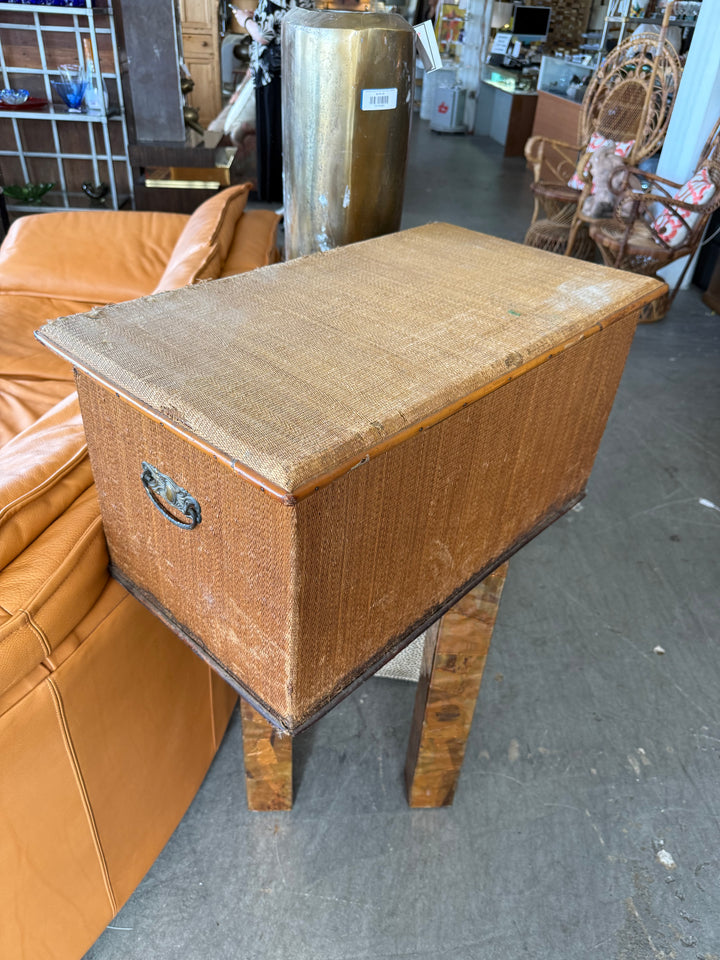 Antique woven with rattan wrapped trunk