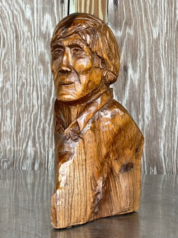 Carved wooden bust of man