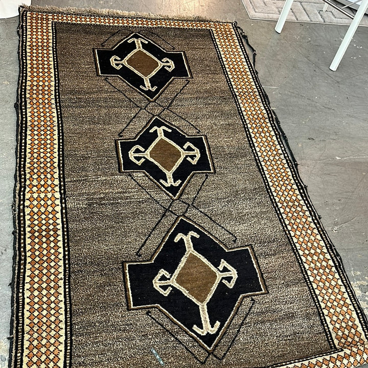 Brown black rug