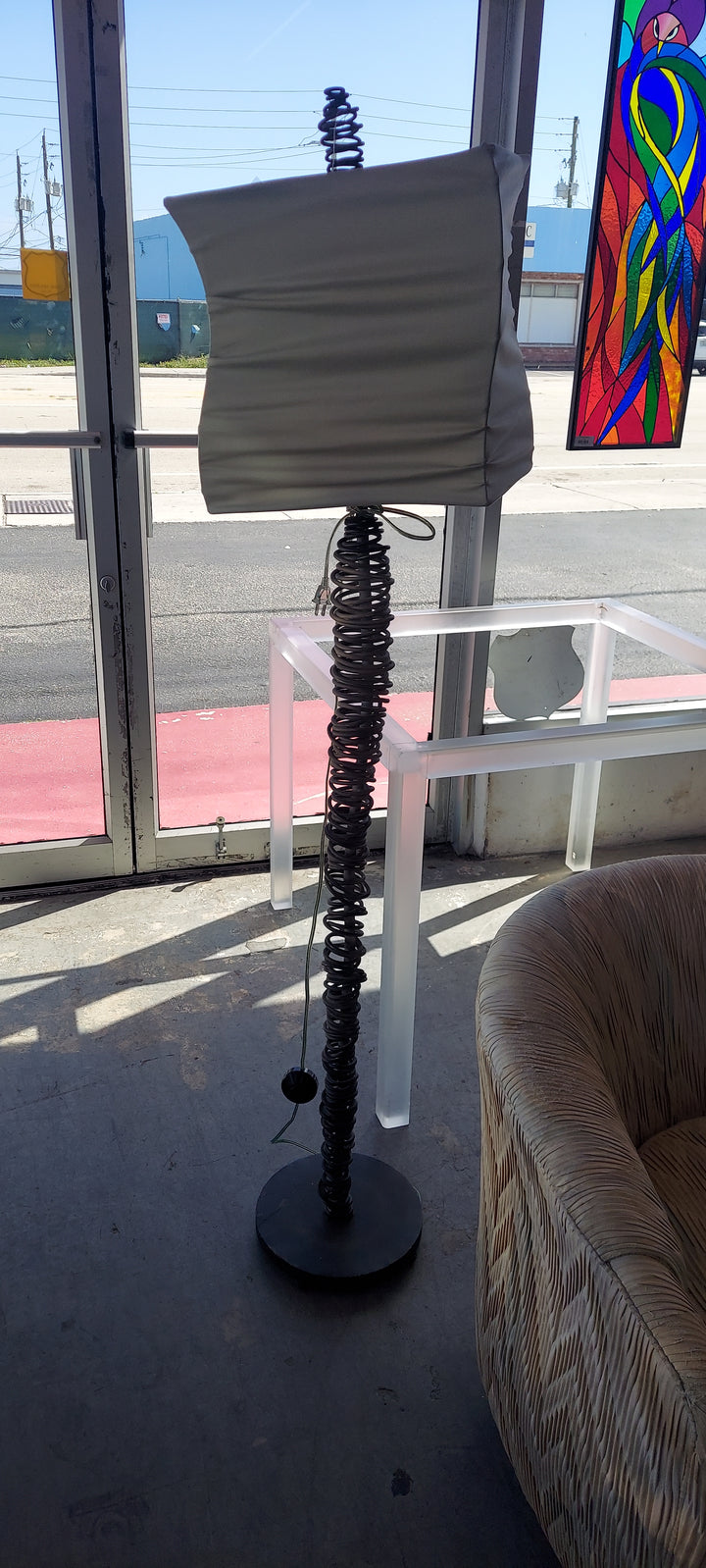 Twisted metal floor lamp