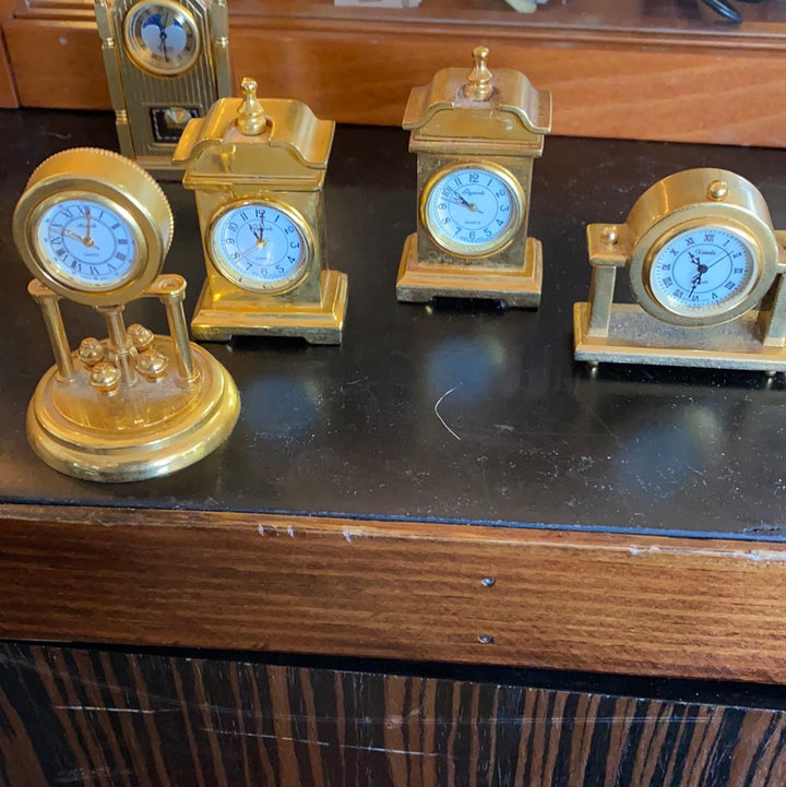 Miniature brass clock