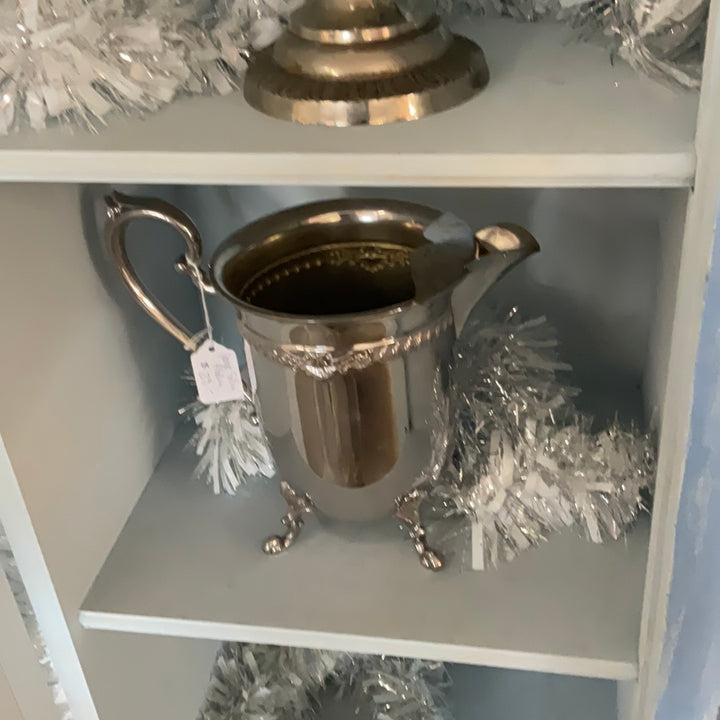 Large silver pitcher